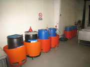 55 gallon drum in Orange safety covers